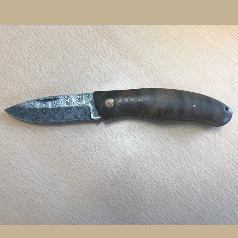 Damascus. Multi layer damascus blade with a lovely burlwood handle. | SportingCutlery.co.uk